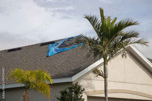 Worn out tarp months after a hurricane