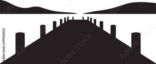 Black silhouette of a pier extending into a body of water with hills