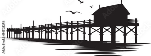 Black silhouette of a pier with a building at the end and
