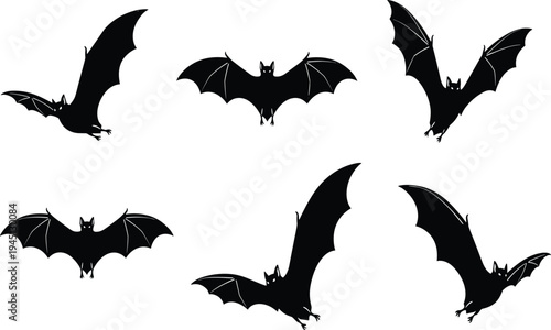 Set of Six Black Bat Silhouettes Flying Isolated on White Background for Horror Halloween Theme Design Element