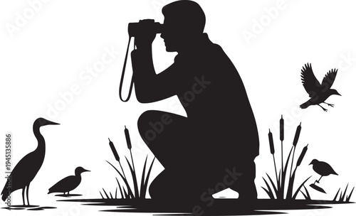 Man photographing birds in wetland with cattails photographer