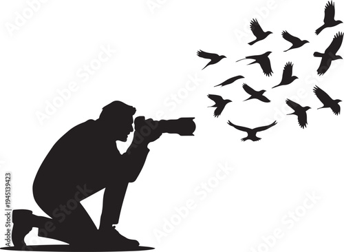 Silhouette of photographer taking of flying birds camera