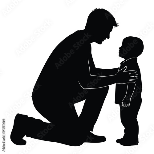 Silhouette of a man kneeling down and talking to a little boy