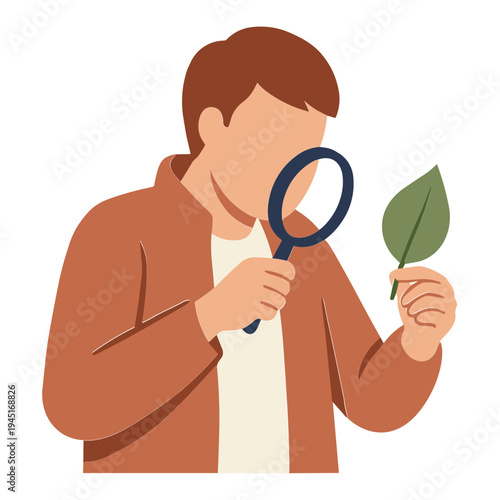 Man examines green leaf with magnifying glass closely