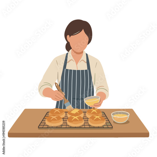 A woman applying glaze to star-shaped pastries on a cooling rack