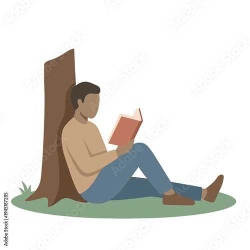 A man reading a book sitting under a tree in a park