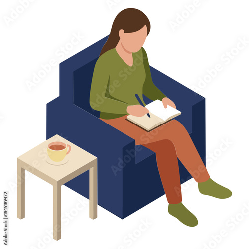 Woman sits on couch writing in notebook with tea on side table