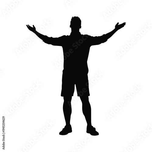 Inspiring Silhouette of a Man Standing with Arms Wide Open in a Gesture of Freedom Acceptance or Worship