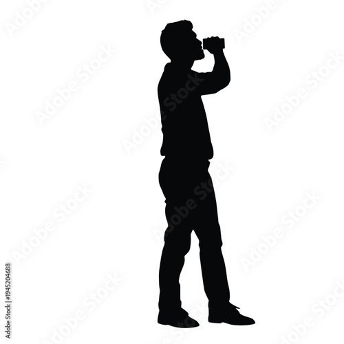 Young Man Silhouette Standing and Drinking from Aluminum Soda Can Side View Profile Refreshment Break Cold Drink and Beverage Lifestyle Concept Image