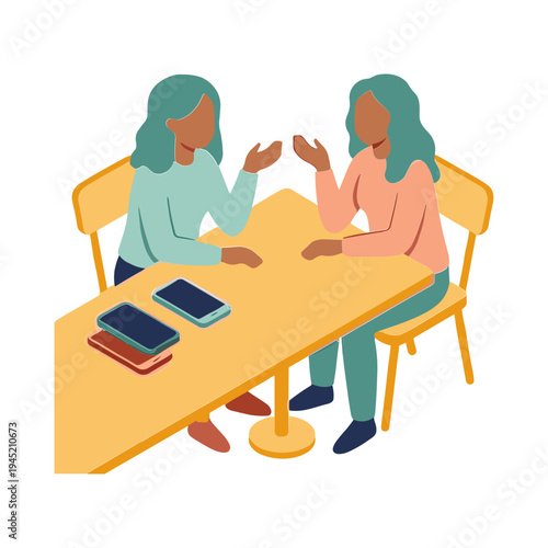 Two women discuss and interact with books on a table indoors