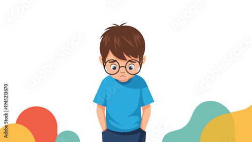 Sad little boy wearing large round glasses and a blue t-shirt looks down with a melancholic expression against a simple background.