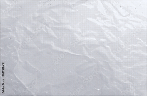 Minimal halftone background with smooth gradient made of tiny dots. Splashes of droplets, liquid from condensation, rain, spray on crumpled cellophane. Dew on a wrinkled surface. Halftone texture.