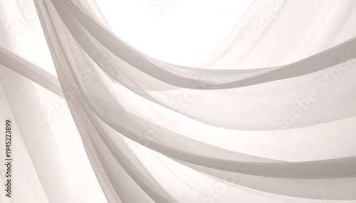 Soft, flowing fabric billows against a white background, creating ethereal light and shadow play