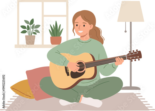 A woman sits on a rug playing an acoustic guitar indoors with plants