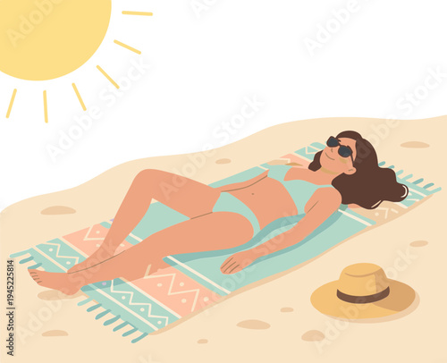 Woman lies on beach towel under sun with hat nearby on sandy shore.