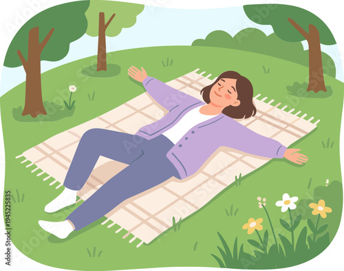 Woman lies on a blanket in a serene park surrounded by trees and flowers