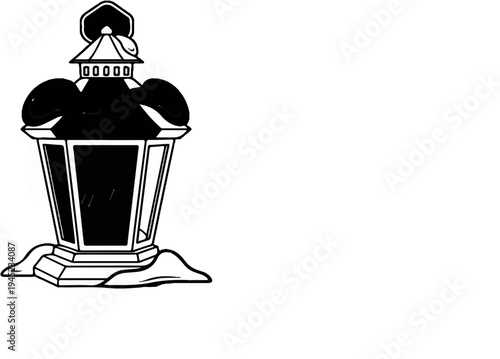 Ornate black lantern with glass panes, decorative top, and ornate base