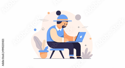 Man with hat and beard working on a laptop, sitting on a stool