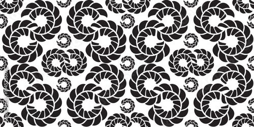 螺旋状の葉模様の連続パターン背景