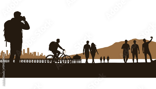 People silhouette walking and cycling along a scenic waterfront promenade
