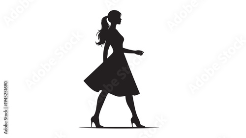 Black silhouette of a woman in a dress walking
