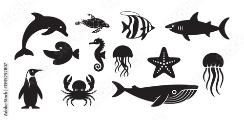 Aquatic wildlife silhouettes featuring whale shark dolphin penguin crab jellyfish and sea turtle