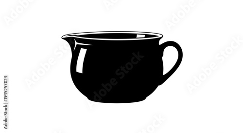 Black Ceramic Pitcher with Handle and Spout, Isolated on White Background