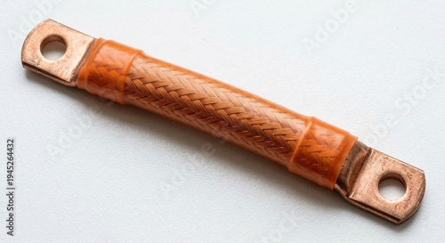 Flexible copper busbar with orange heat shrink insulation and exposed terminals isolated on white background
