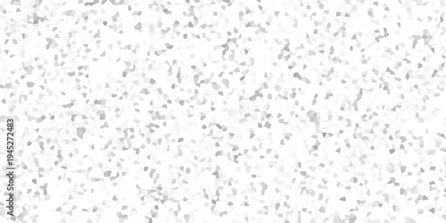 Subtle geometric mosaic pattern with varying shades of grey and white creating a textured abstract background for design applications