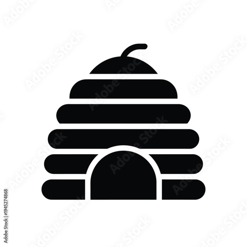 Simple black and white illustration of a classic beehive structure