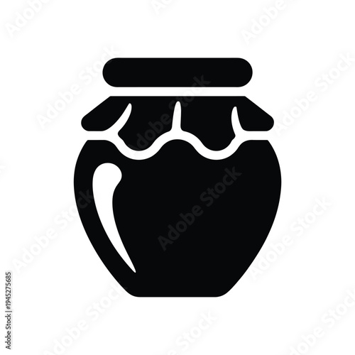 Simple black silhouette of a jar with a handle and lid