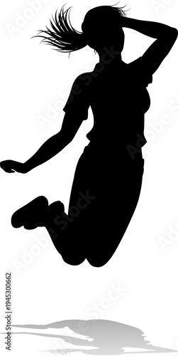 A happy woman jumping for j...
