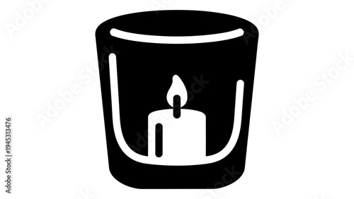 Black glass candle holder with white candle inside decorative container