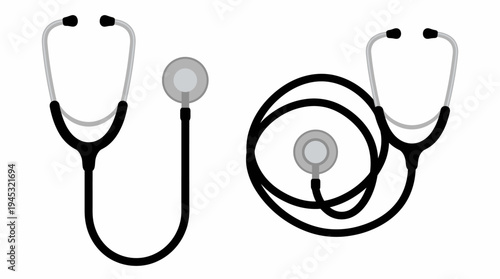 Two black and grey stethoscopes, one laid out in a U-shape and the other coiled, used for medical examination on a white background.