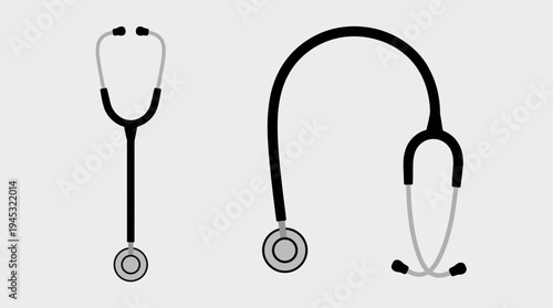Two medical stethoscopes in black and grey, one straight and one curved, on a light background, representing healthcare and diagnostic tools.