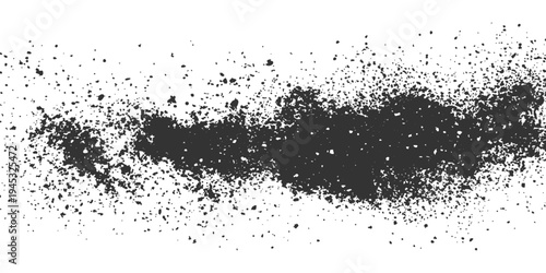 Dark charcoal powder, scattered and clustered. A stark contrast with an elegant form, creates a visual texture and organic feel. 