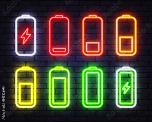 Set of neon battery icons showing different charge levels and lightning symbol. Bright colorful energy indicators glowing on dark brick wall background