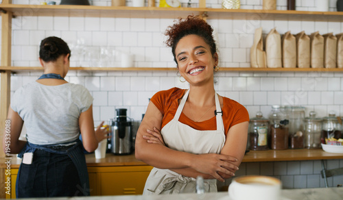 Фотография Portrait, entrepreneur or woman with arms crossed in coffee shop, restaurant industry or customer service