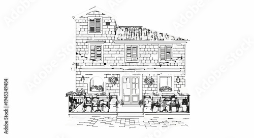 Stone facade building with potted plants and paved entryway