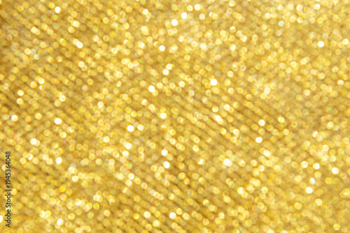 Golden glitter bokeh background with sparkling light circles for festive and luxury design