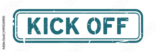 A teal colored stamp displaying the words kick off in bold uppercase letters