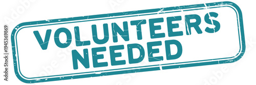 A teal colored sign urgently requests volunteers displaying the message volunteers needed