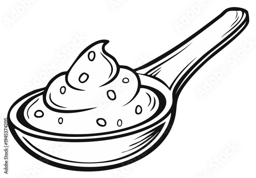 Spoon of creamy dip with small bubbles and a textured surface