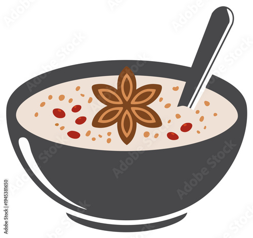 Bowl of porridge with star anise and red berries garnished with small seeds for breakfast or dessert