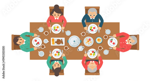 People sitting around a dining table eating.