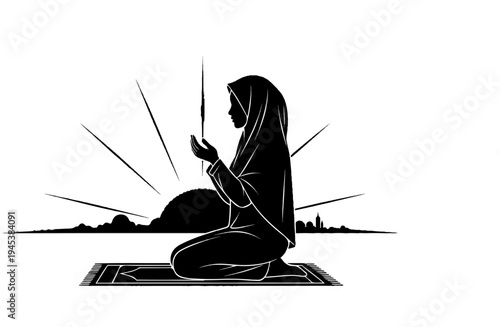 Silhouette of a woman in hijab praying on a mat at sunrise