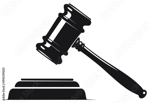 Black judge gavel striking a sound block representing law justice and auction authority