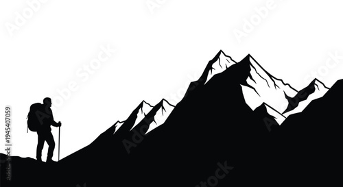 Hiker with backpack ascends mountain range striking black silhouette