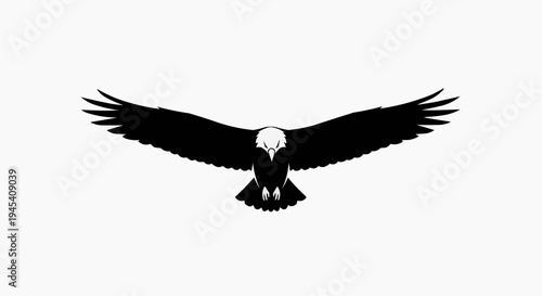 A majestic eagle in flight with its wings spread wide in a powerful and dynamic hunting posture