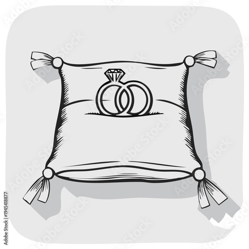 Engraved wedding rings on a pillow for a marriage proposal symbol